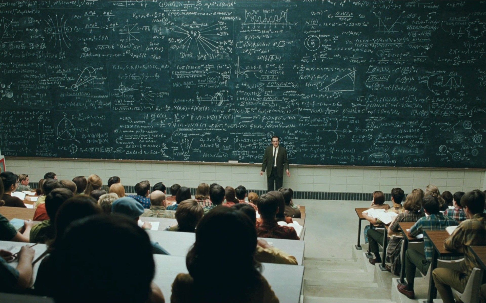 University teacher and students in auditorium